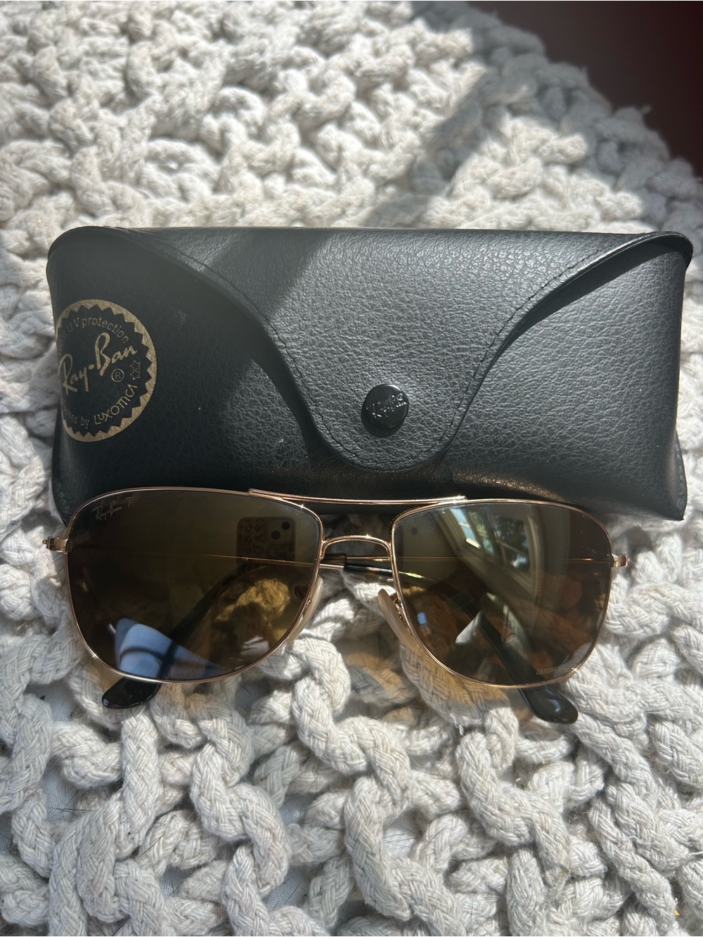 Ray -Ban women’s Cromance polarized gold sunglasses